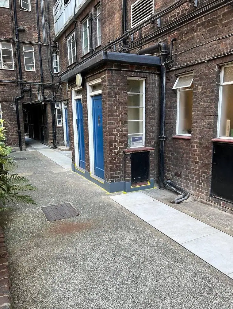 Porch and courtyard elevation after redecoration