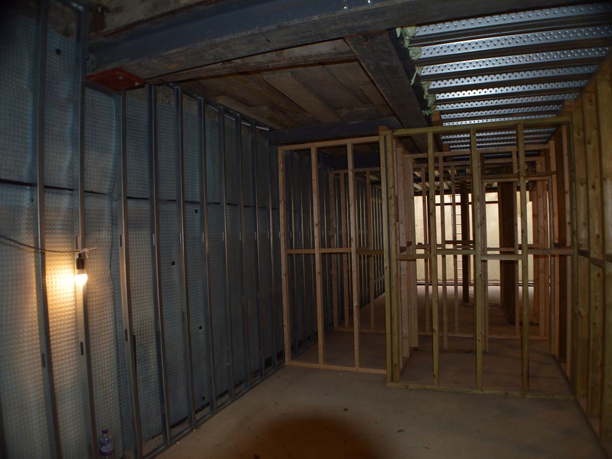 The basement excavation and structural works beneath the existing building