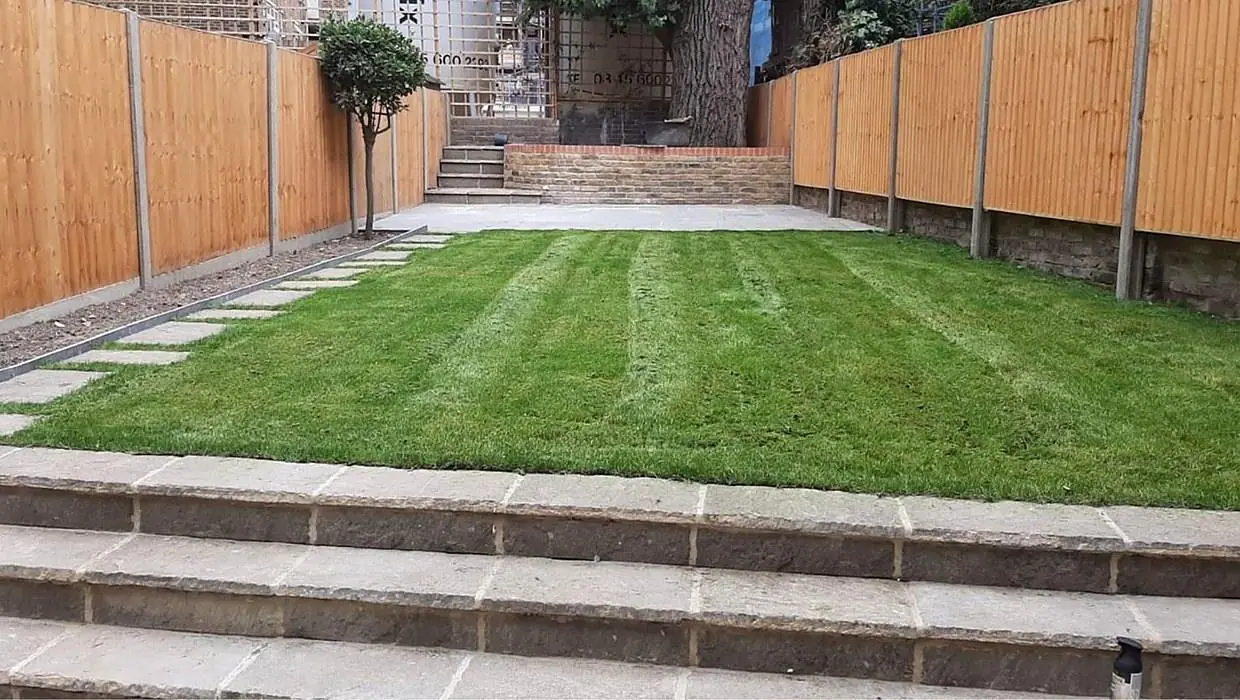 Landscaped garden with new stone steps and lawn
